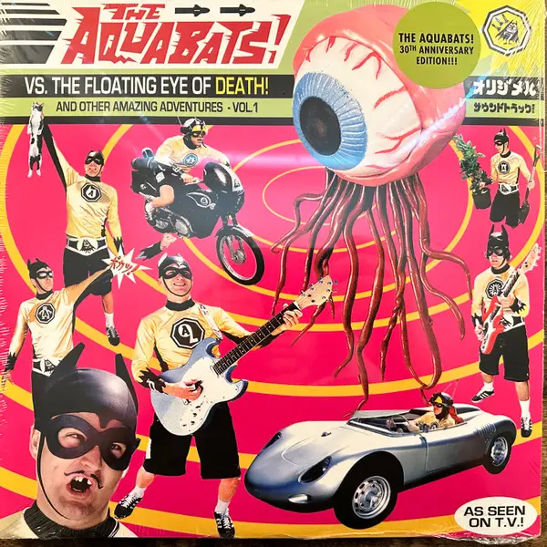 The Aquabats! - Vs. The Floating Eye Of Death! And Other Amazing Adventures - Vol. 1 (2 пластинки, Кровавые брызги, Розовый, Альбом, Лимитированое, Переиздание) - фото №1